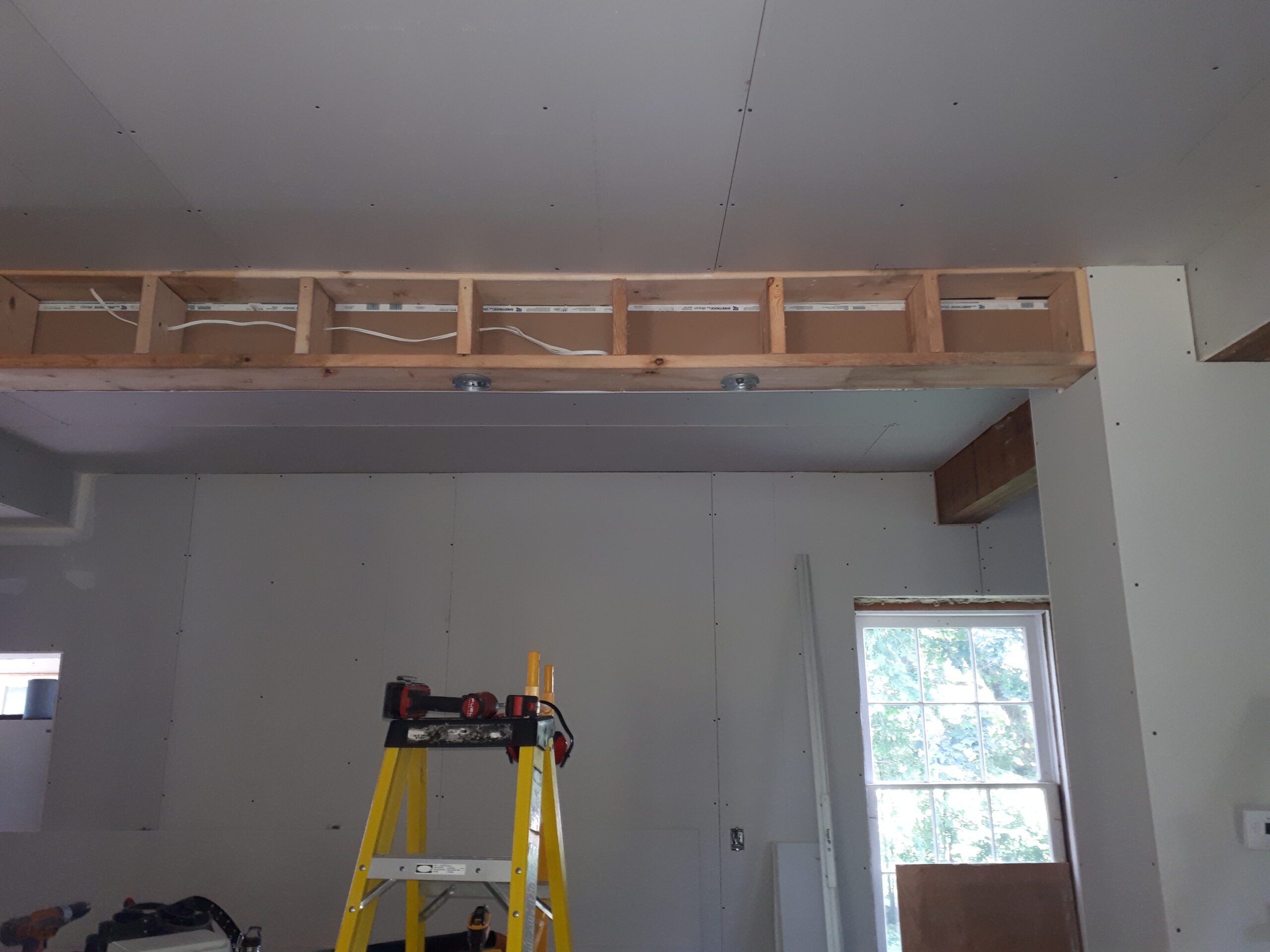 bulkhead installation with pot lights