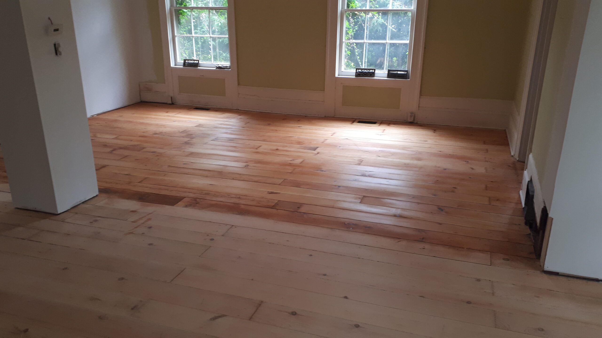 staining a floor refinishing
